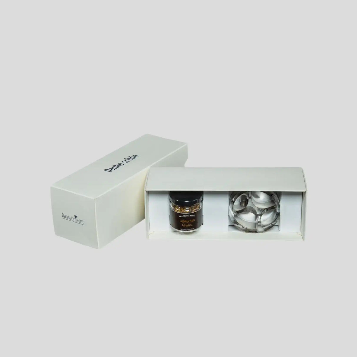 Dankepräsent mit einem winterlichen Keksausstecher und passendem Vanillezucker hier als Radschläger, andere Formen auf Anfrage abrufbar