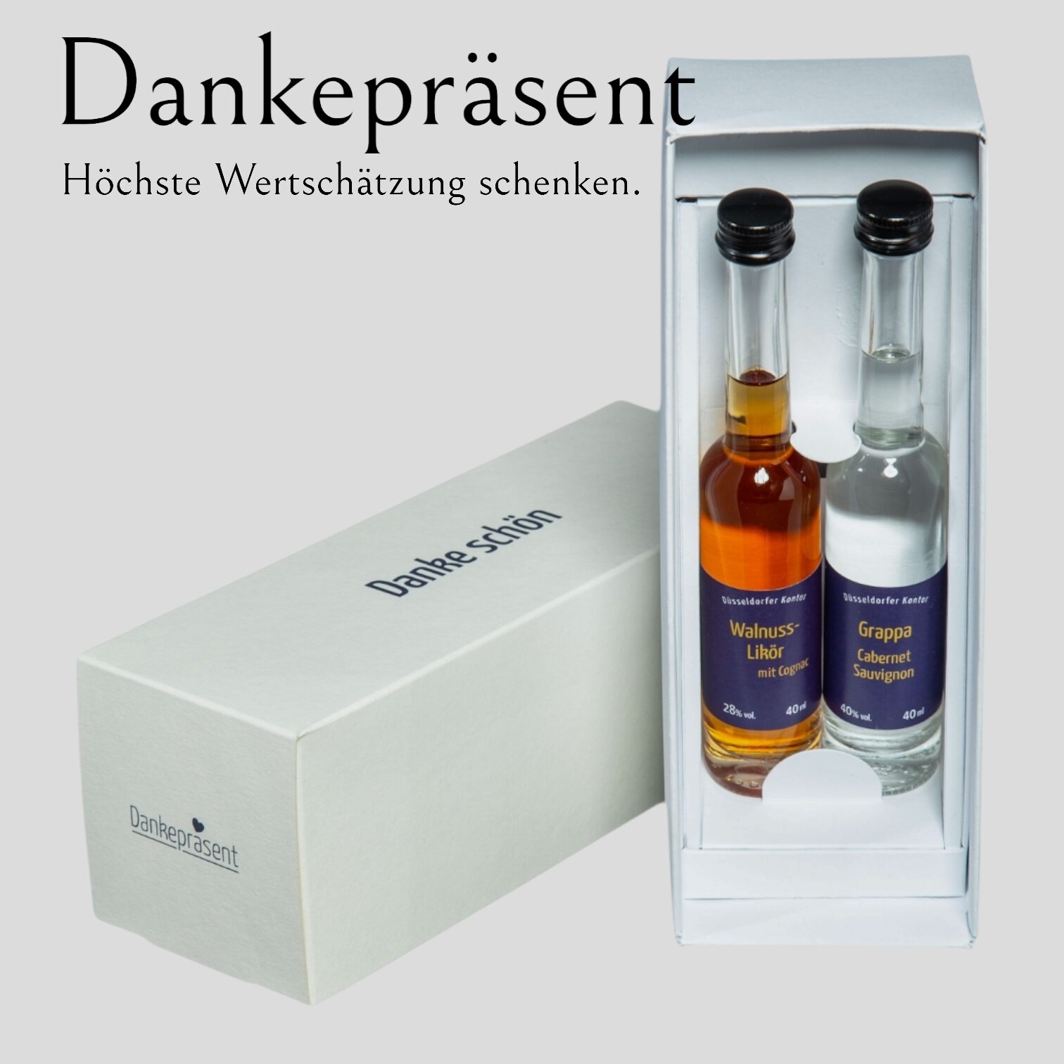 Dankepräsent, eine edle Geschenkbox mit einem wunderbaren Walnusslikör und einem milden Grappa.