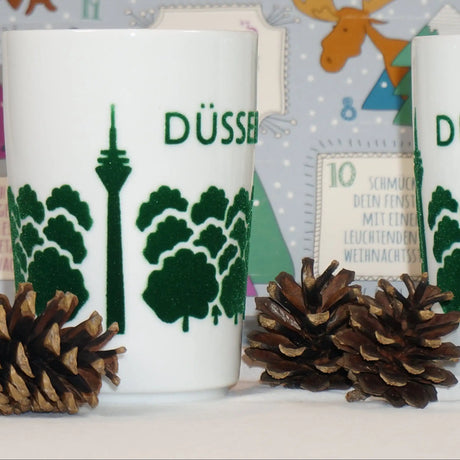KAHLA Kaffeebecher ELA Düsseldorf mit Samtbeflockung und Baum-Spende.