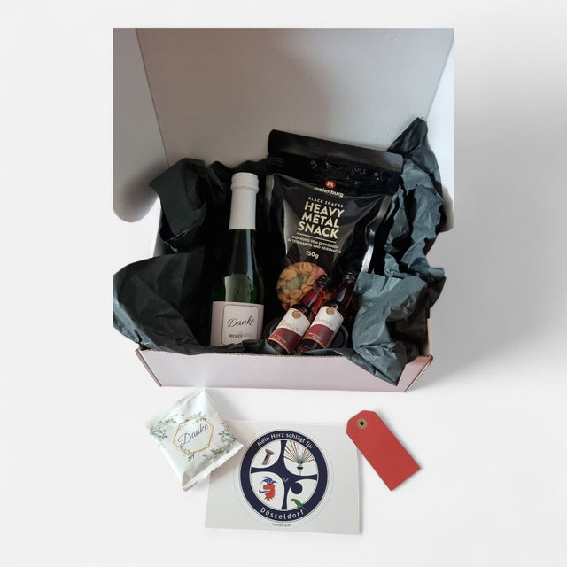 Düsseldorfer Spritz Box von Dankepräsent mit dem Rossivo-Likör Wilde Himbeere und dem Sekt mit Danke-Etikett dreisprachig