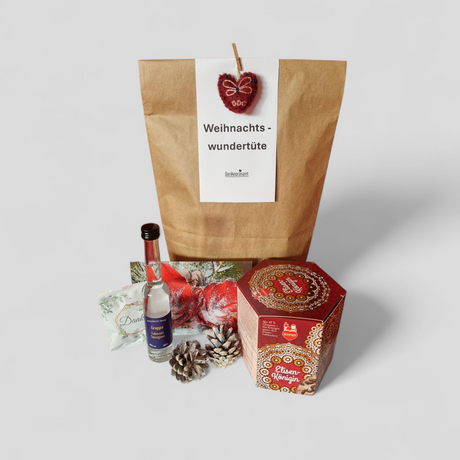 Weihnachts-Wundertüte mit wunderbaren Elisen mit 40% Nussanteil & einem milden Grappa - Düsseldorfer Kontor ❤️ 