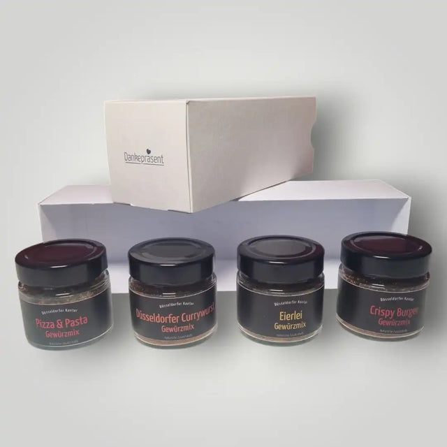 Große ‚Danke schön‘-Geschenkbox vom Düsseldorfer Kontor mit vier erlesenen Gourmet-Gewürzen. Hochwertiges Präsent-Set für Kunden und Mitarbeiter, stilvoll verpackt in der neutralen Dankepräsent-Box für echte Wertschätzung. 