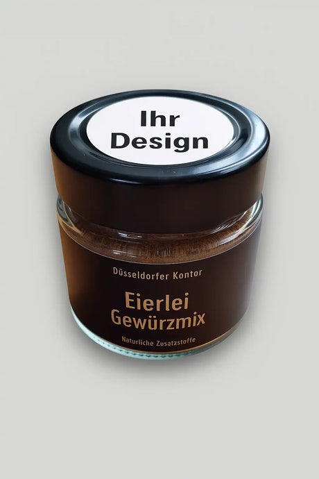 Kompaktes Gewürzglas "Eierlei" mit individuellem Logo-Aufkleber auf dem Deckel. Hochwertige Veredelung für Unternehmen, bundesweiter Versand auch bei kleineren Auflagen.