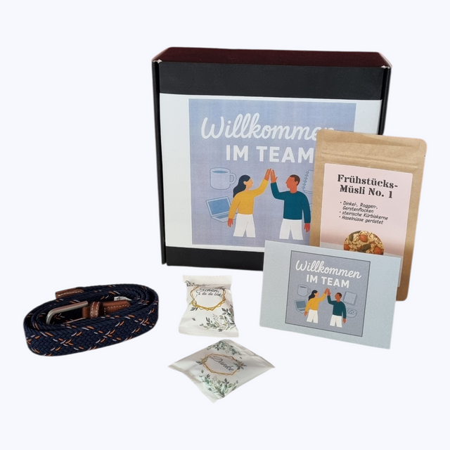 Onboarding-Box für Azubis von Dankepräsent Düsseldorf. Inhalt: Flechtgürtel in CI-Farben in Absprache, Müsli & Begrüßungskarte „Willkommen im Team“. Hochwertiges Firmengeschenk zur Mitarbeiterbindung, bundesweit als skalierbare Onboarding-Lösung verfügbar.